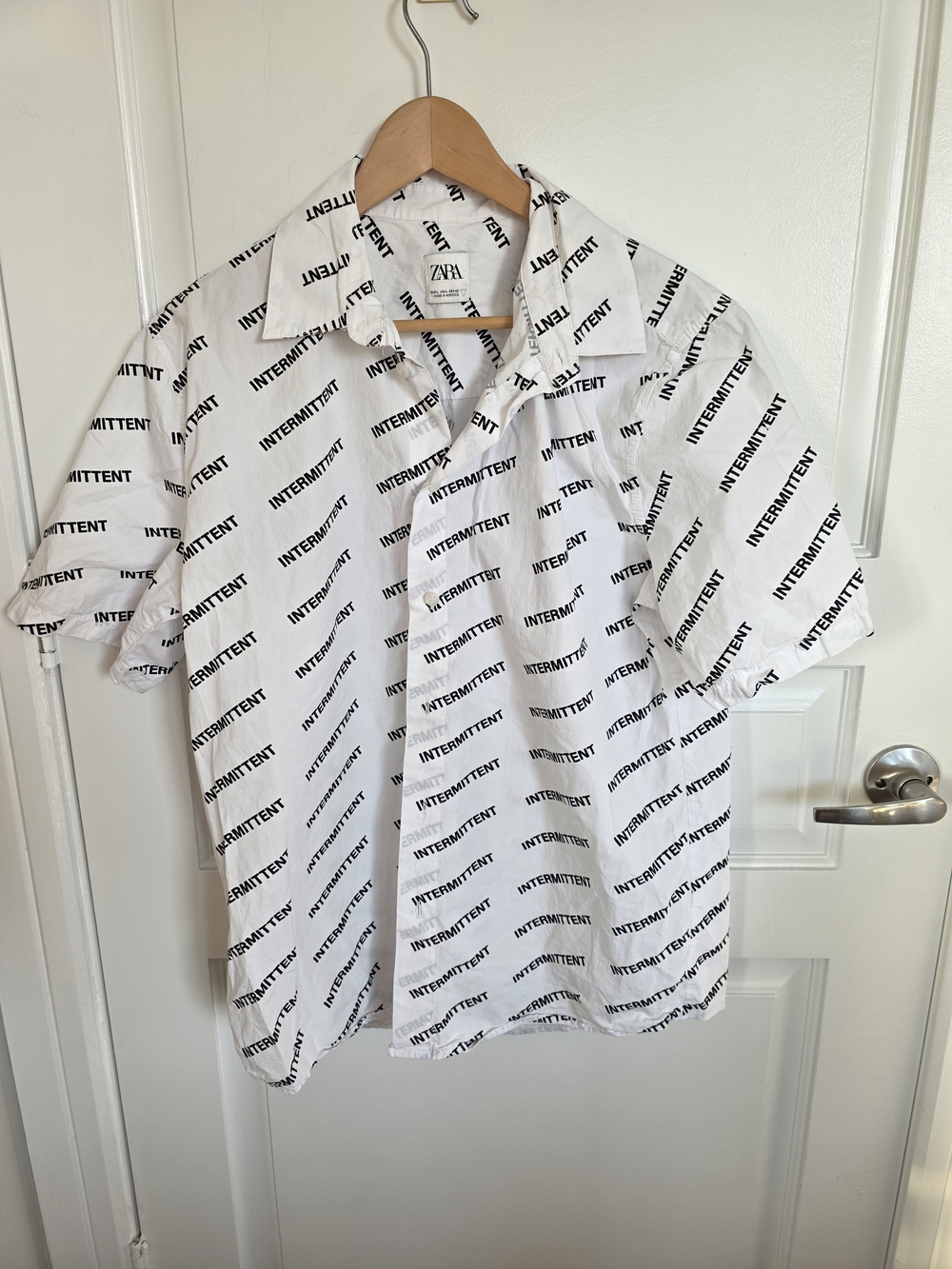 Zara White Short-Sleeve Button-Down with Black 'INTERMITTENT' Print
